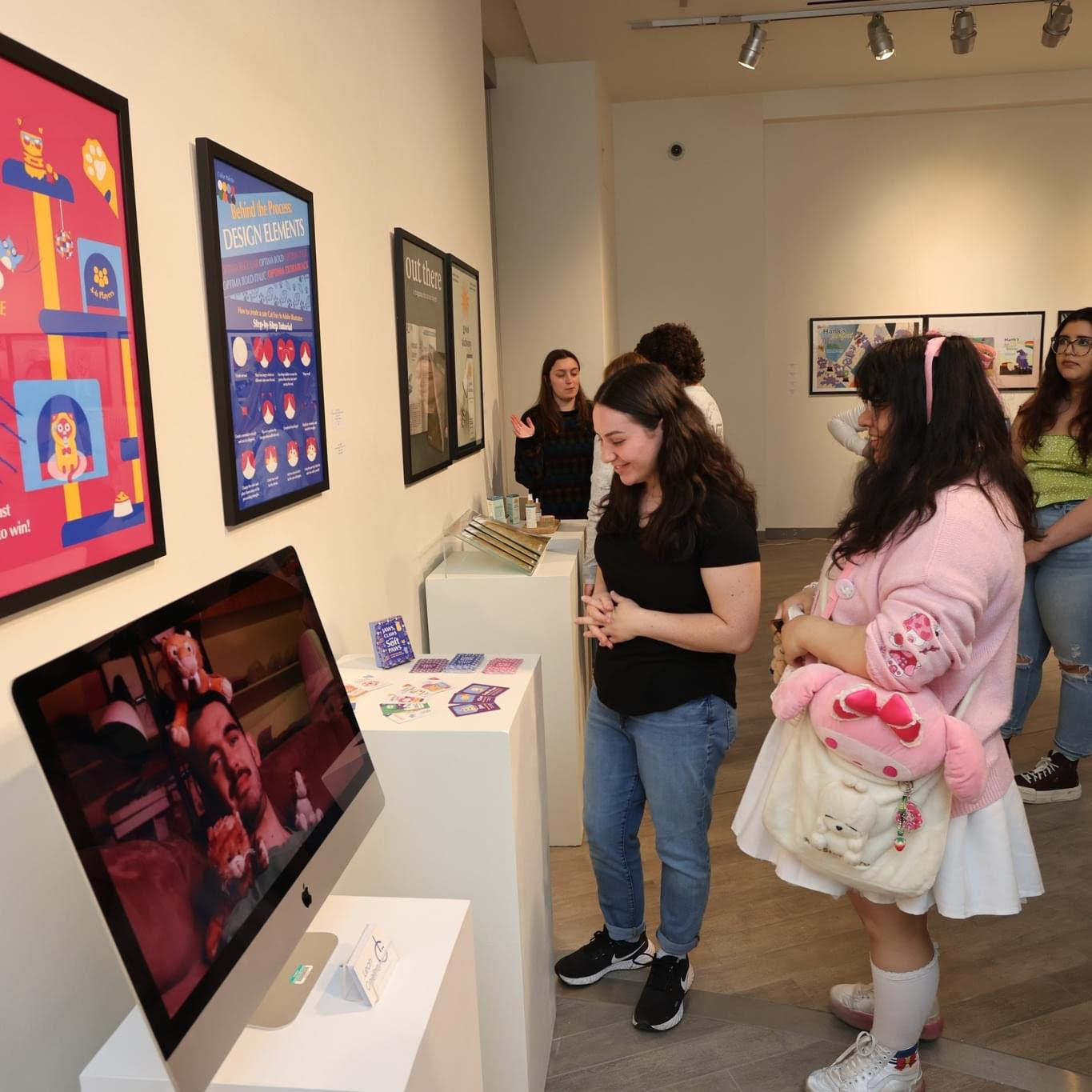 Visitors checking-out the exhibition display.