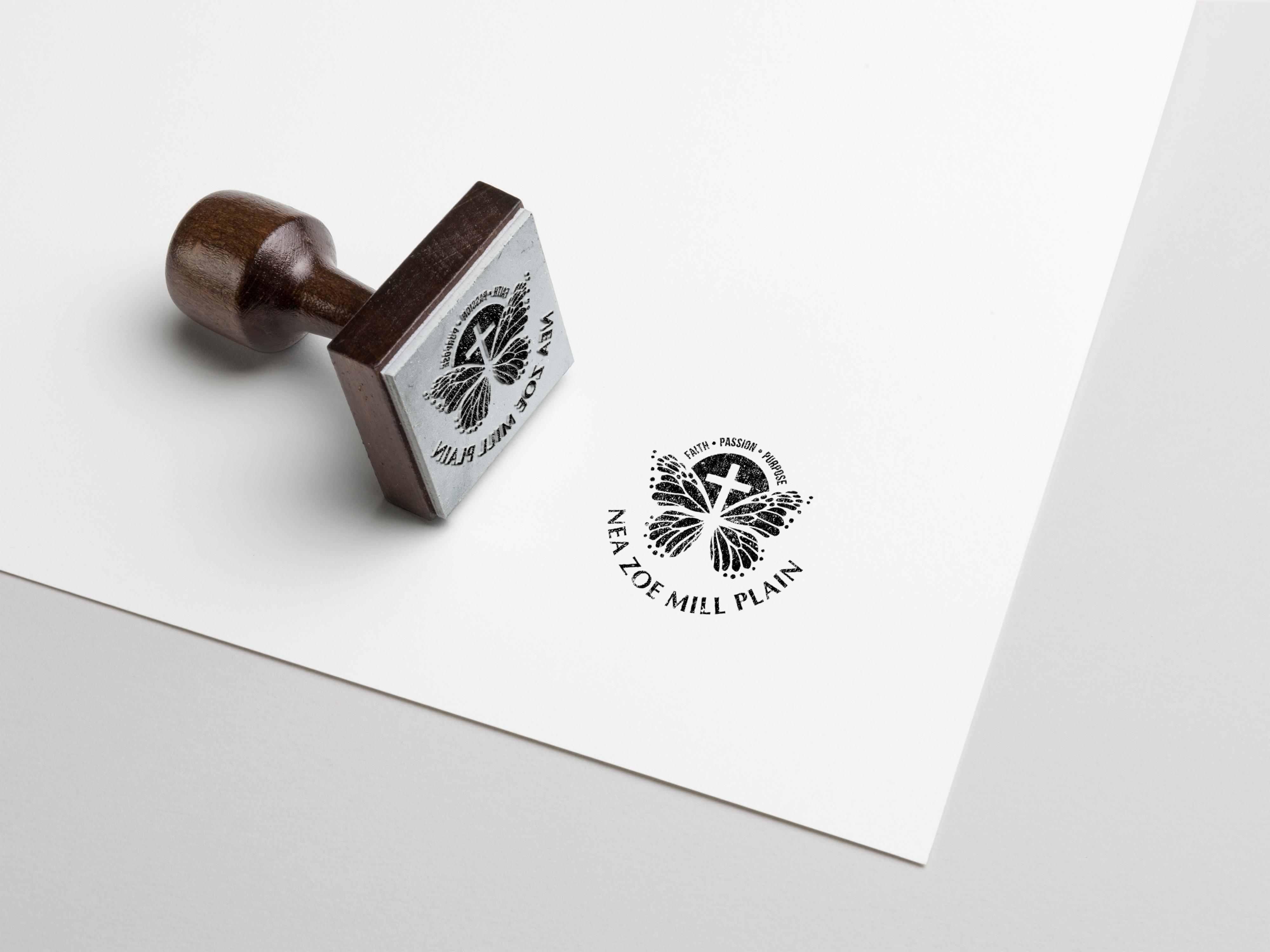 Branded stamp mockup of logo on paper.